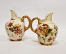 Late 19th century Royal Worcester porcelain blush ground jug with gilt handle, floral decorated,