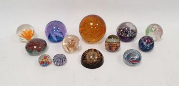 Collection of glass paperweights to include Caithness 