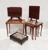 20th century walnut nest of three tables, a magazine rack, a two-tier coffee table, a folding table,