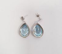 Pair white metal and blue and white stone drop earrings, pear-shaped