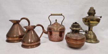 Copper haystack measure 24cm, another copper haystack measure 19cm, a brass oil lamp base, a