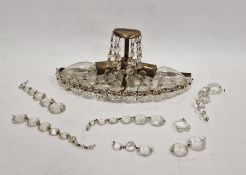 Early 20th century brass wall light with cut glass drops.