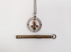 Silver propelling pencil and a silver-coloured pendant on chain, circular, leaf and fruit-shaped
