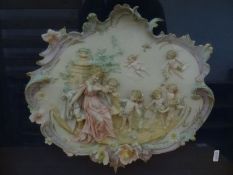 Pair of continental porcelain wall plaques, framed and glazed