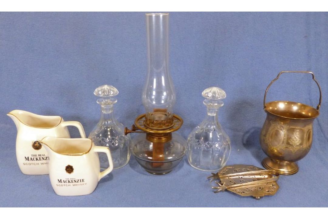 Pair of Webb Corbett cut glass decanters, two Wade Mackenzie Scotch Whisky pottery jugs, an oil