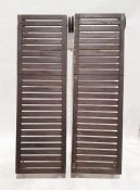 Pair of wooden garden sunloungers, 193cm x 60cm and pair of drop-leaf garden tables, 63cm x 73cm x