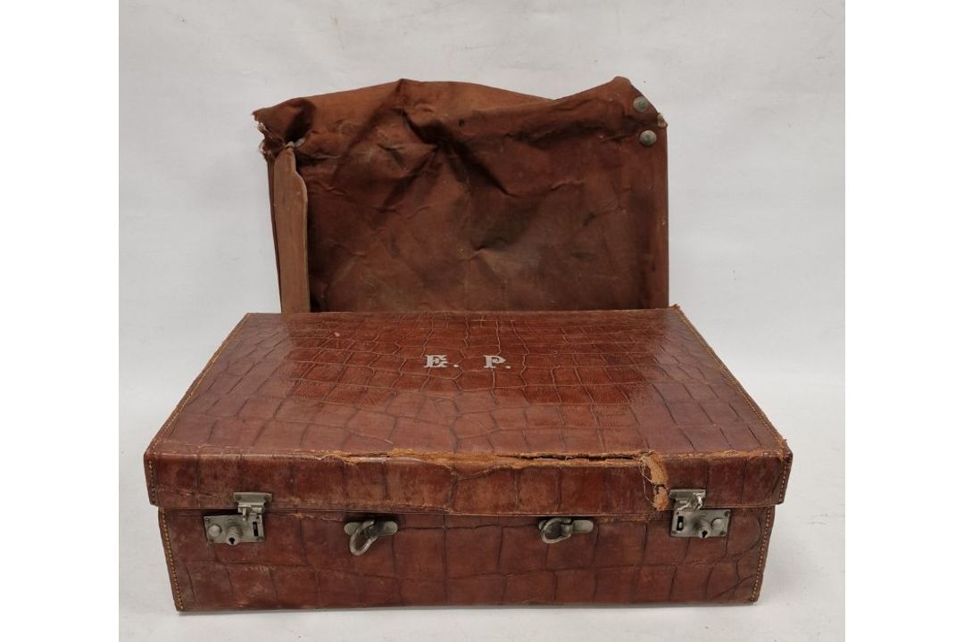 A crocodile skin suitcase, early to mid 20th century, gilt lettering stamped for John Bagshaw & - Image 1 of 36