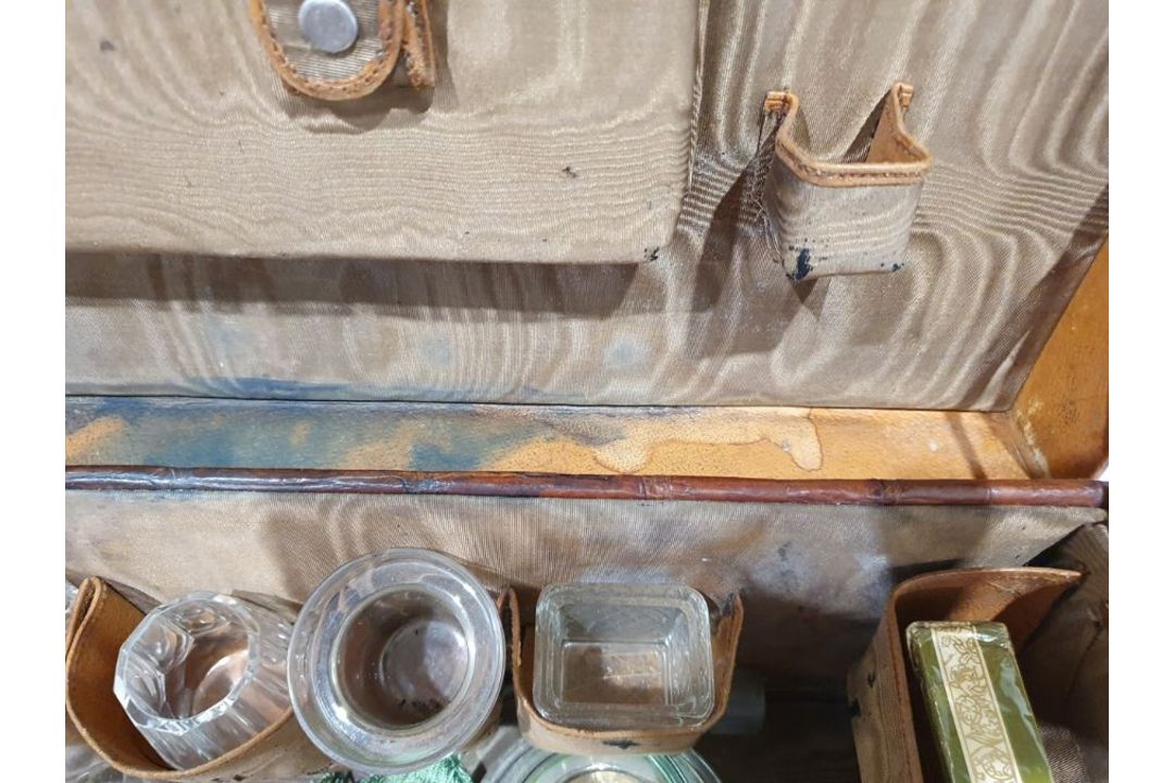 A crocodile skin suitcase, early to mid 20th century, gilt lettering stamped for John Bagshaw & - Image 23 of 36