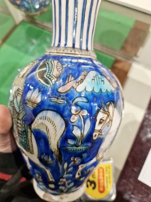 Two 19th century Persian Kajar Dynasty pottery vases, the first bottle-shaped painted with birds - Image 21 of 26