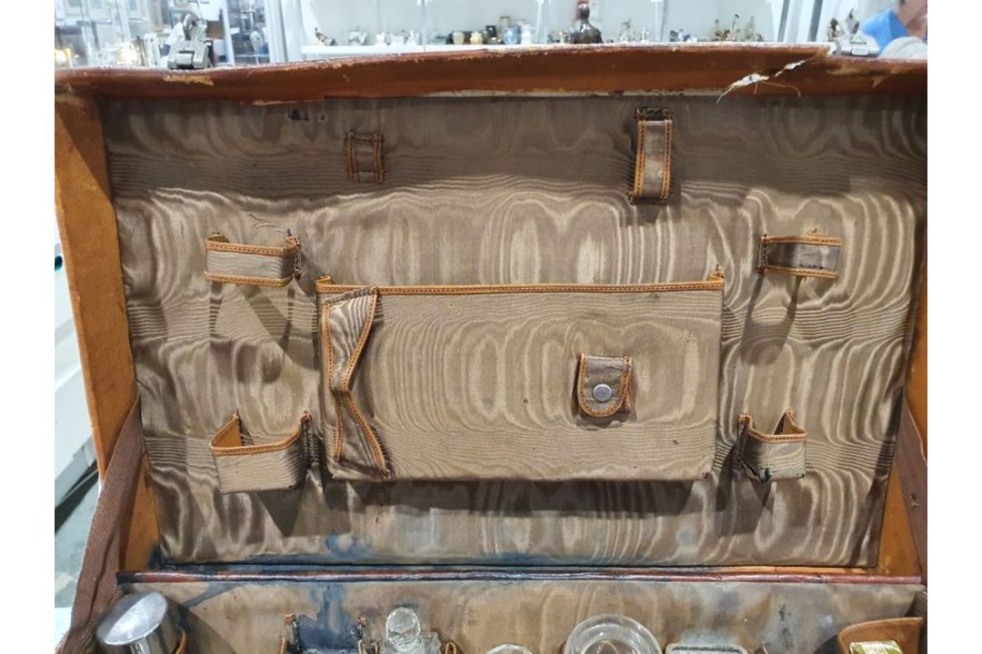 A crocodile skin suitcase, early to mid 20th century, gilt lettering stamped for John Bagshaw & - Image 20 of 36