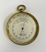 Brass cased Dolland of London compensated pocket barometer, circa 1900, the silvered dial marked