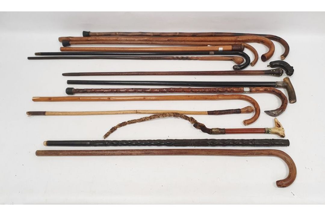 Quantity of assorted walking sticks to include a child's hunting crop with the horn handle formed as - Image 1 of 12