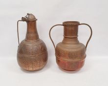 Middle Eastern copper ewer, with hammered design, a single handle, 48cm high approx with a Middle