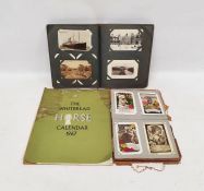 Two albums with vintage postcards to include saucy seaside cards, topographical, vintage birthdays