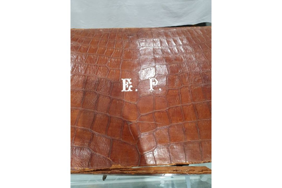 A crocodile skin suitcase, early to mid 20th century, gilt lettering stamped for John Bagshaw & - Image 7 of 36