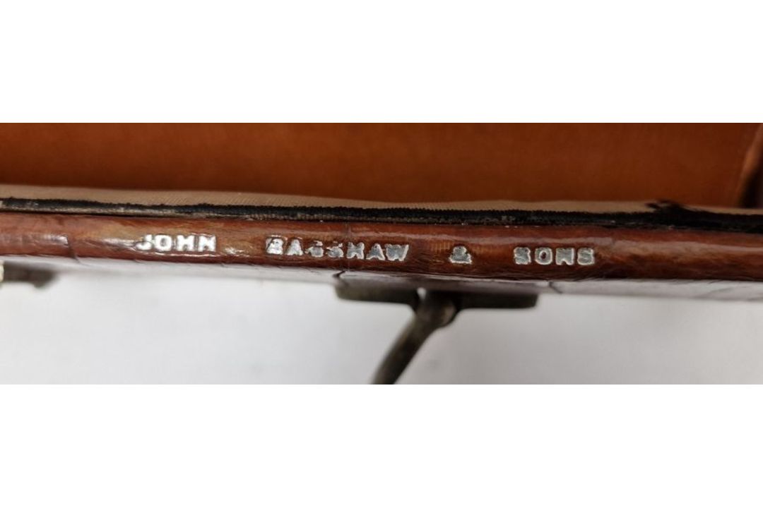 A crocodile skin suitcase, early to mid 20th century, gilt lettering stamped for John Bagshaw & - Image 3 of 36