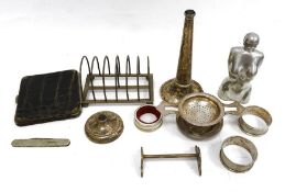 Silver six-division toast rack, round arch (handle missing), pair silver napkin rings and sundry
