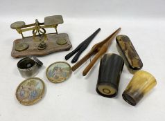 Small set of postal scales, two glove stretchers, two horn beakers, a tortoiseshell-backed clothes