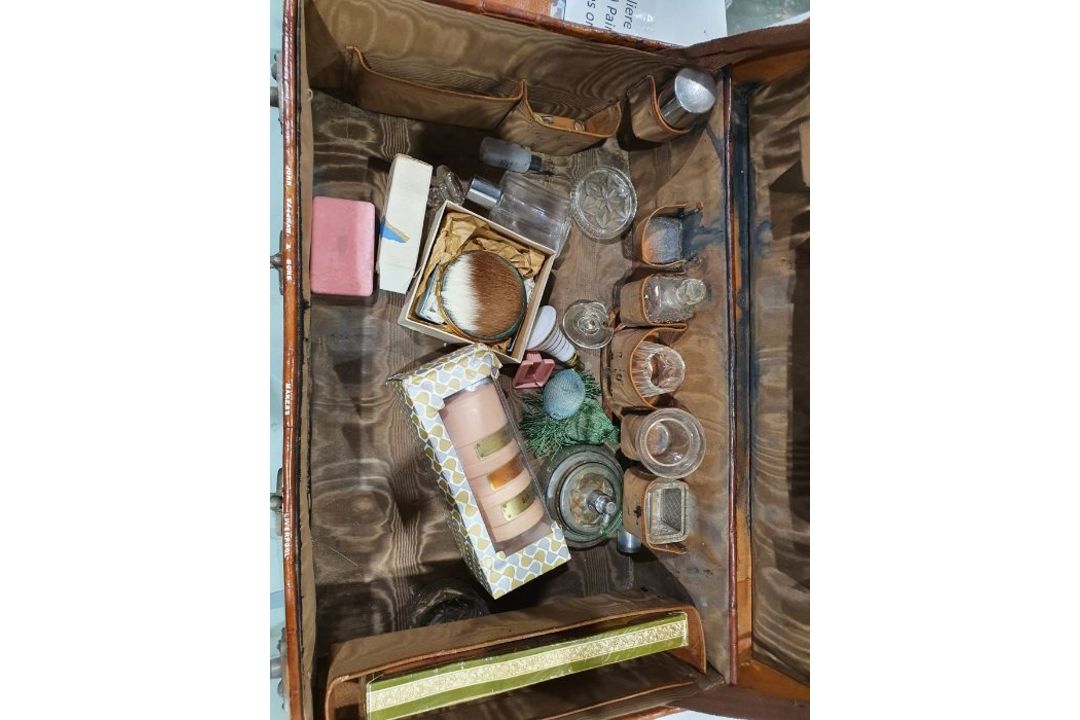 A crocodile skin suitcase, early to mid 20th century, gilt lettering stamped for John Bagshaw & - Image 19 of 36