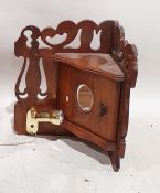 Walnut wall-hanging corner cupboard with carved decoration