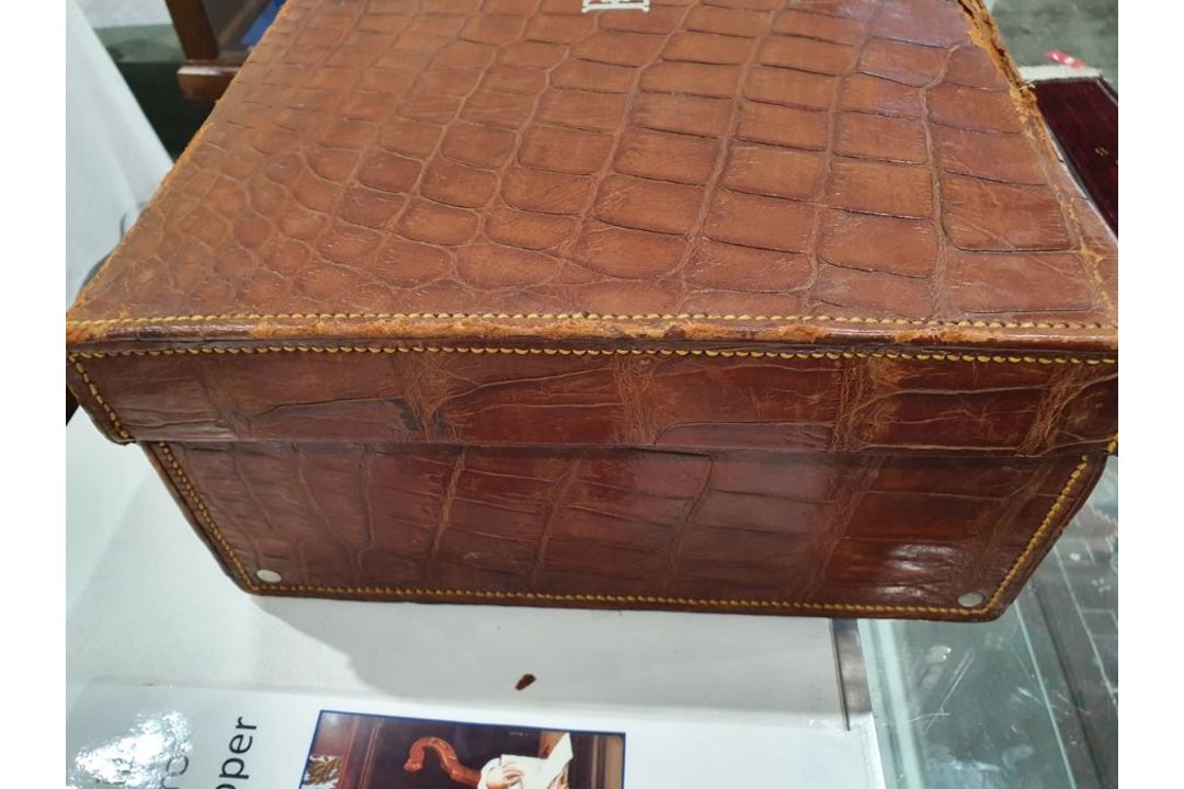A crocodile skin suitcase, early to mid 20th century, gilt lettering stamped for John Bagshaw & - Image 14 of 36