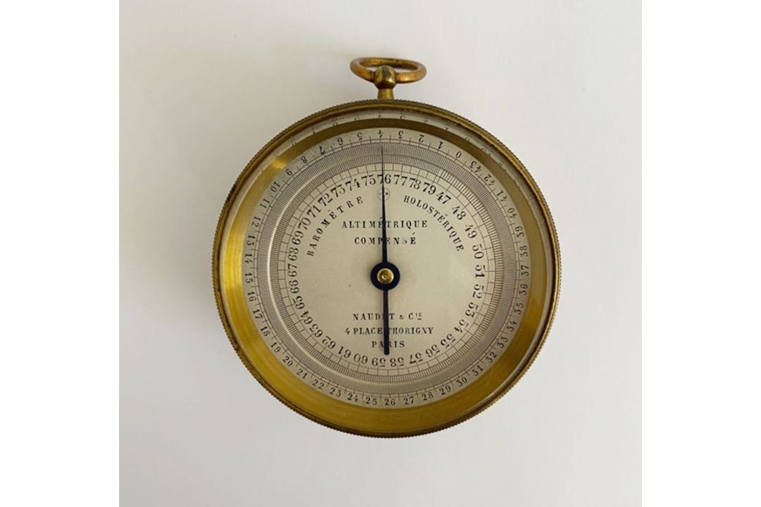 Late 19th/early 20th century French gilt-metal cased pocket barometer produced by Naudet & Cie,