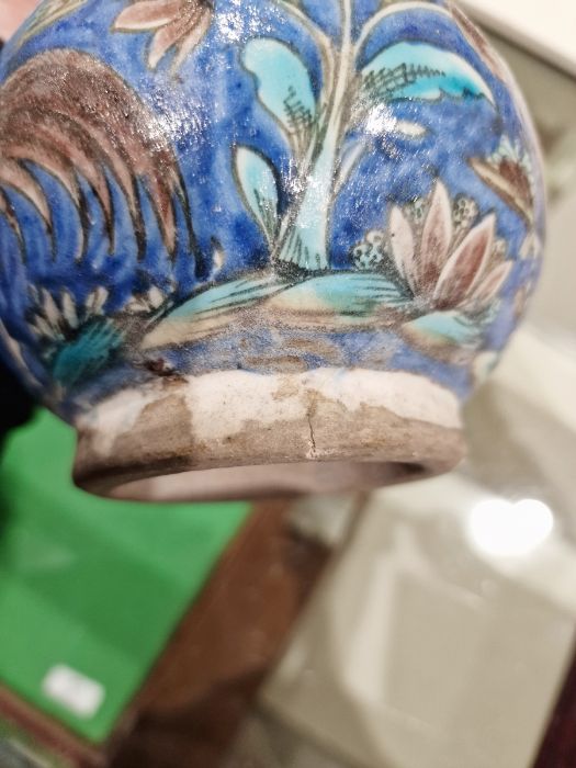 Two 19th century Persian Kajar Dynasty pottery vases, the first bottle-shaped painted with birds - Image 12 of 26