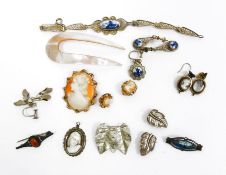 Silver and carved shell cameo oval pendant, a silver and enamel brooch with sailing boat decoration,