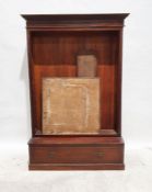 Edwardian bookcase, the moulded cornice above adjustable shelves, on base with single drawer, raised