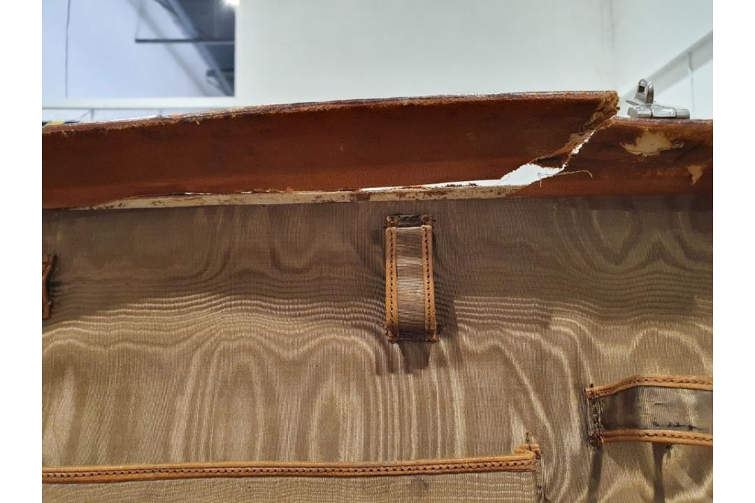 A crocodile skin suitcase, early to mid 20th century, gilt lettering stamped for John Bagshaw & - Image 29 of 36