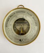 Late 19th century French brass cased skeleton holosteric barometer, the silvered dial marked PHNB