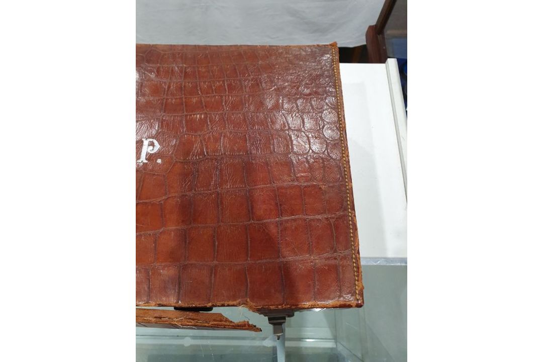 A crocodile skin suitcase, early to mid 20th century, gilt lettering stamped for John Bagshaw & - Image 6 of 36