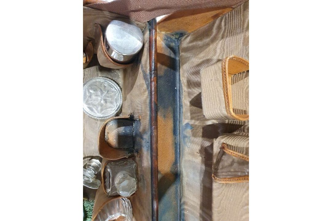 A crocodile skin suitcase, early to mid 20th century, gilt lettering stamped for John Bagshaw & - Image 22 of 36