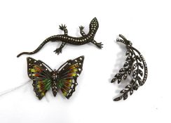 Continental silver, enamel and marcasite butterfly brooch with pierced wings, a marcasite lizard