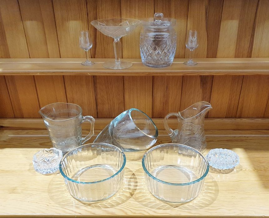 Collection of assorted glassware comprising a cut glass jug with bands of laurels, 16cm high, a