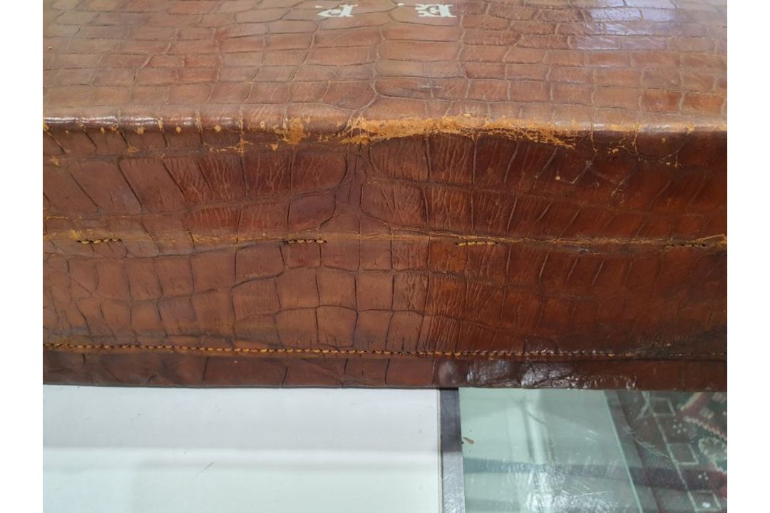 A crocodile skin suitcase, early to mid 20th century, gilt lettering stamped for John Bagshaw & - Image 16 of 36