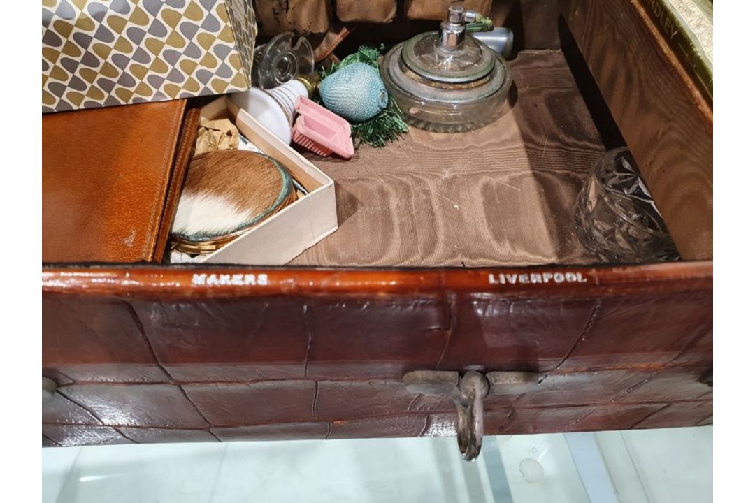 A crocodile skin suitcase, early to mid 20th century, gilt lettering stamped for John Bagshaw & - Image 31 of 36