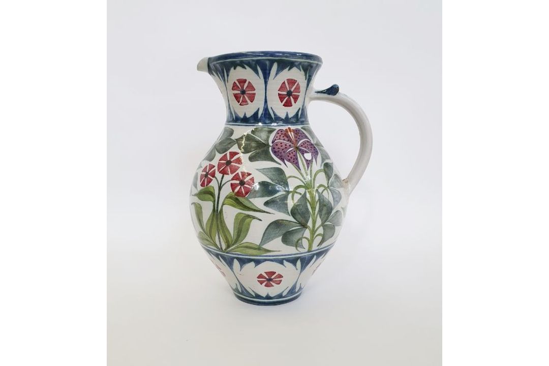Laurence McGowan (b.1942) a stoneware pitcher with floral decoration on white ground, signed to base - Image 2 of 4