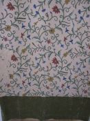 Mid-20th century hand-embroidered crewel-work panel (made into a curtain) featuring floral designs