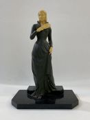 Early 20th century Art Deco-style figure of female form with fan, plastic head and hands, the
