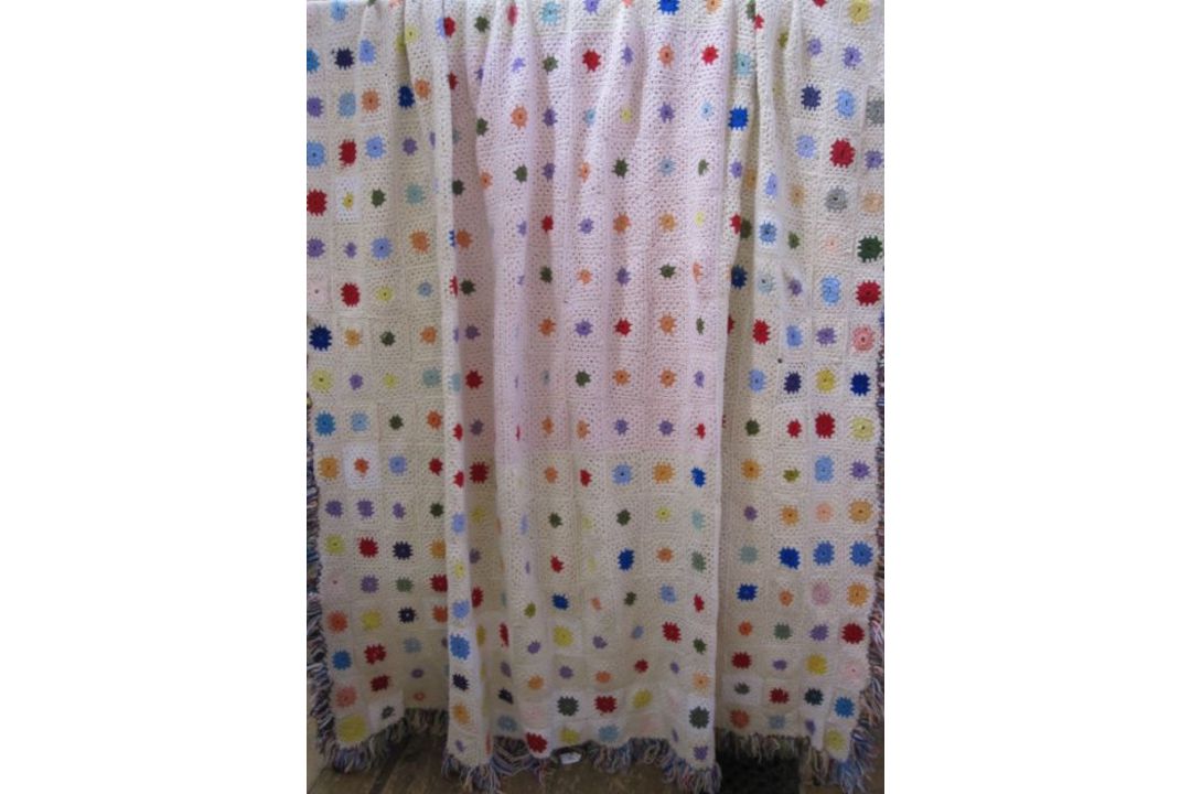 Vintage 1960's - 70's large crocheted blanket, coloured squares with fringe - Image 1 of 4