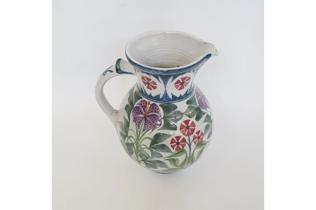Laurence McGowan (b.1942) a stoneware pitcher with floral decoration on white ground, signed to base - Image 3 of 4