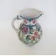 Laurence McGowan (b.1942) a stoneware pitcher with floral decoration on white ground, signed to base - Image 3 of 4
