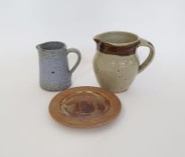 Three pieces of The Friars, Aylesford studio pottery to include a jug with tenmoku and oatmeal