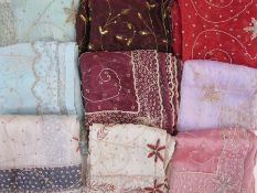 Box of middle-eastern sequinned and bejewelled textiles, two small silk cushions, three small fabric