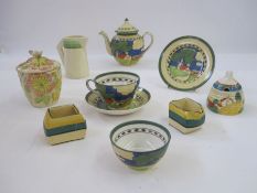 Clarice Cliff honeypot, beehive shape painted with red roof house and landscape, 8.5cm high, Booth's