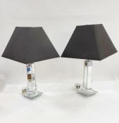 Pair of modern table lamps with mirrored glass finish and square black silk shades