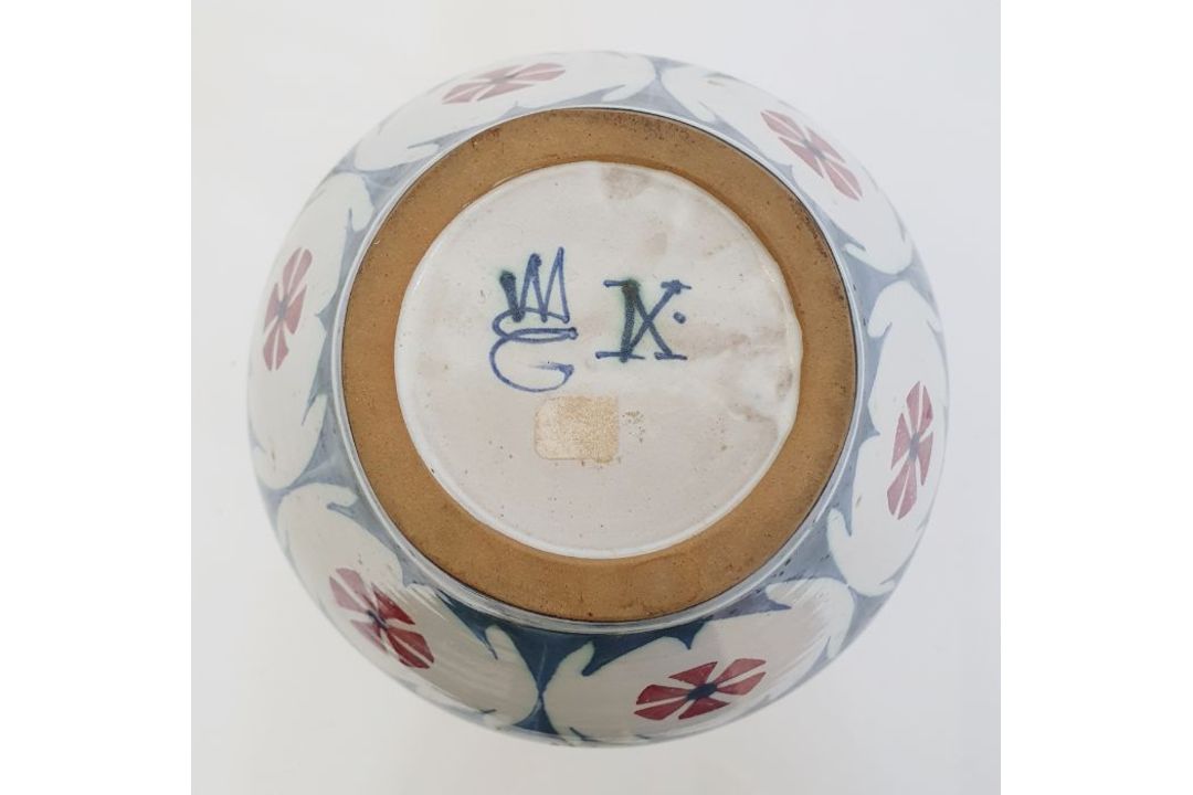 Laurence McGowan (b.1942) a stoneware pitcher with floral decoration on white ground, signed to base - Image 4 of 4