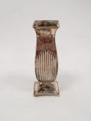 Early 20th century silver miniature vase, semi-gadrooned, on a square base, Birmingham 1916, maker