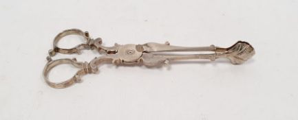 Pair of George III silver sugar nips, London maker and date mark worn, possibly 1760, possibly
